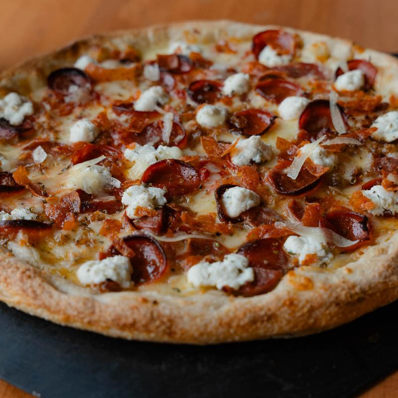 Award-winning Peppino's pizza with cup & char pepperoni and ricotta